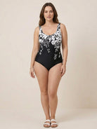Curve-Fit Open-Back Swimsuit with deep V-back and adjustable straps in black polyester fabric