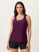 Three-piece tankini set with criss-cross back and printed sports bra and boy shorts