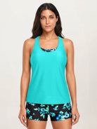 Criss-cross back three-piece tankini set with loose solid tank, printed sports bra, and boy shorts