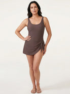 Ruched Wrap One-Piece Swimdress with adjustable straps and tie-front wrap skirt in matte fabric