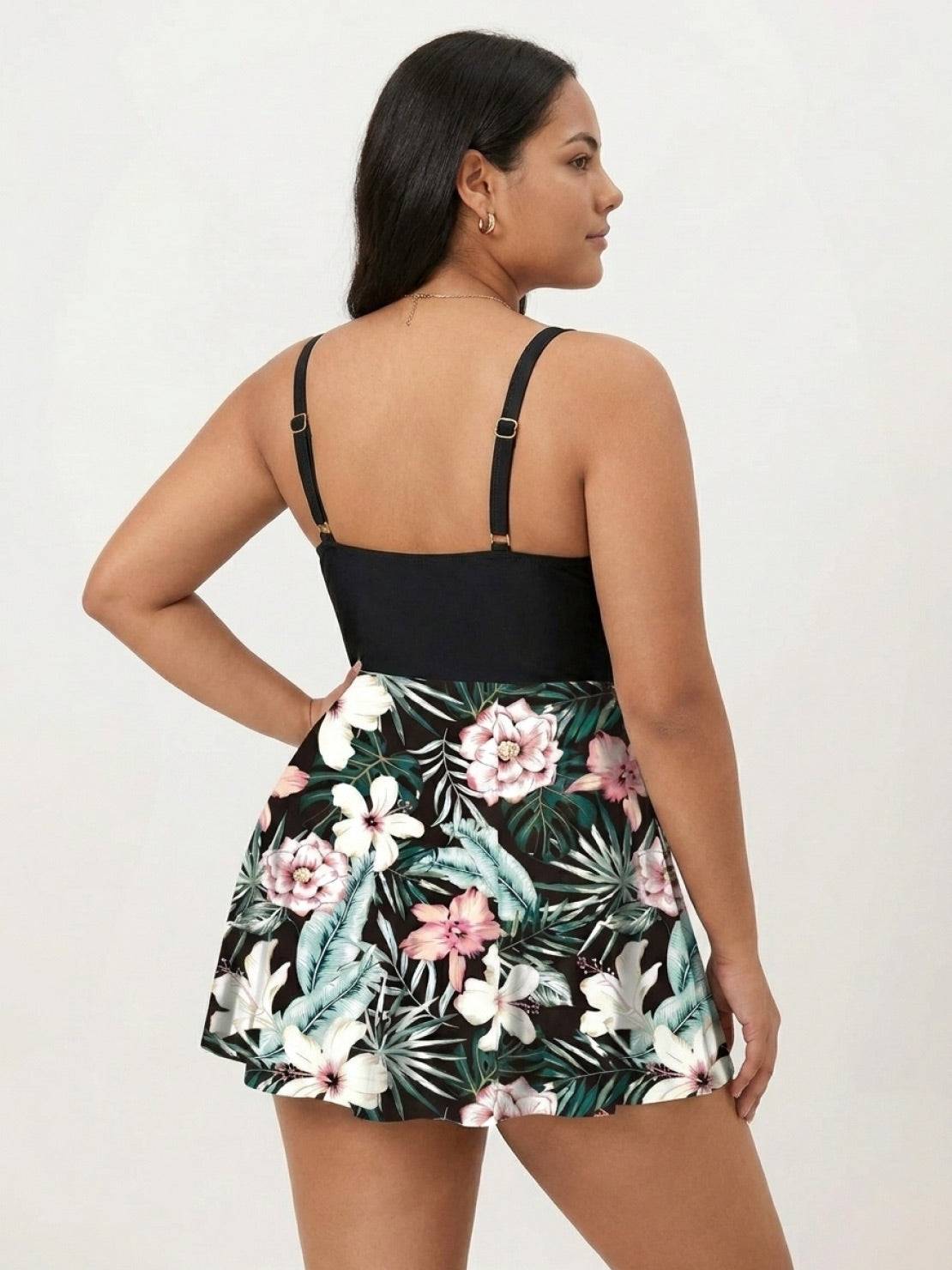 Tropical crossover skirted one-piece swimsuit with deep-V top and floral high-waist skirted bottom