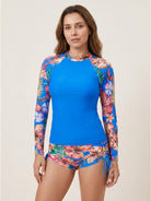 Tropical print rash guard set with long sleeves and boy-cut shorts for sun protection and water activities