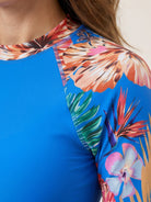 Tropical print rash guard set with long-sleeve top and boy-cut swim shorts