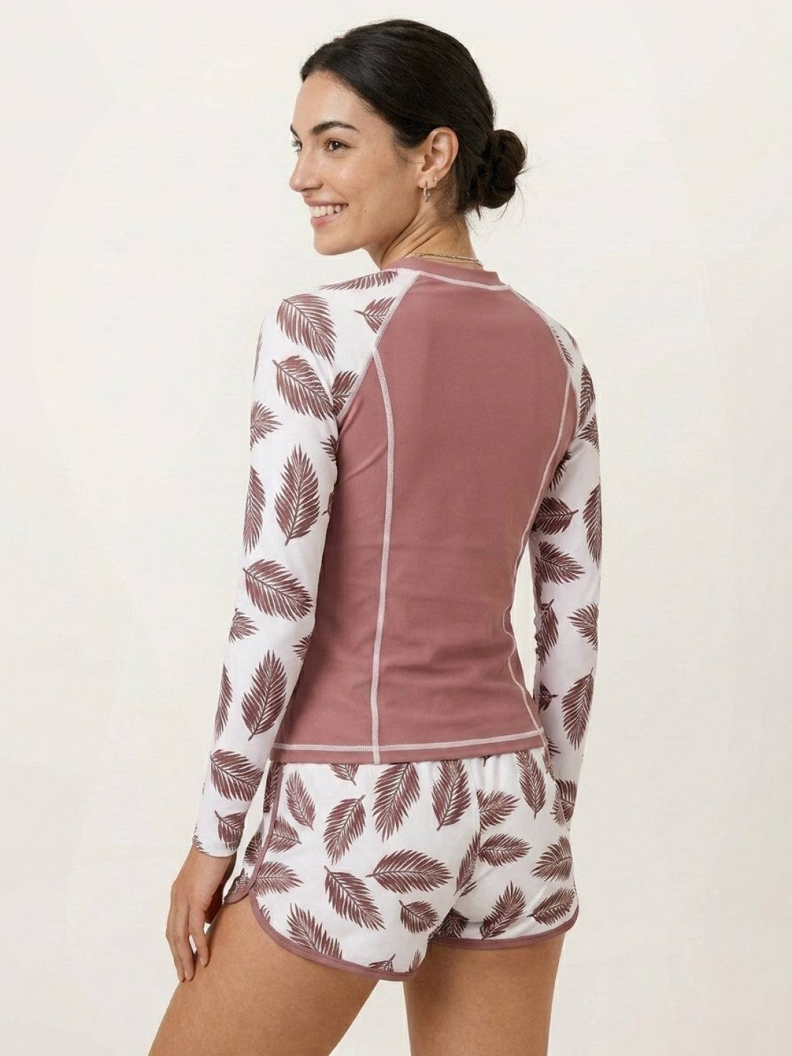 Long-sleeve UV rash guard set with tropical print sleeves and matching swim shorts
