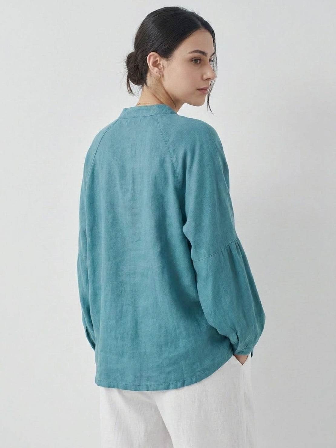 Oversized linen-cotton tang knot blouse with batwing sleeves and asymmetric hem