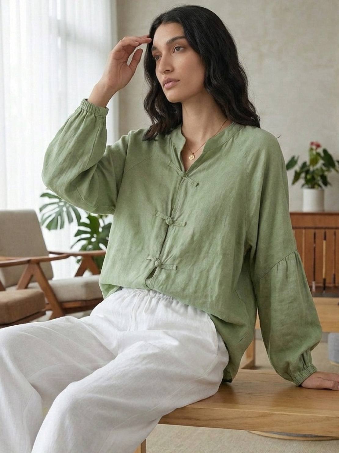 Oversized linen-cotton blouse with batwing sleeves and curved hem in sage green