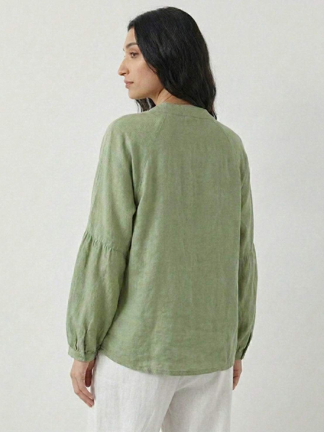 Oversized linen-cotton tang knot blouse with batwing sleeves and asymmetric hem