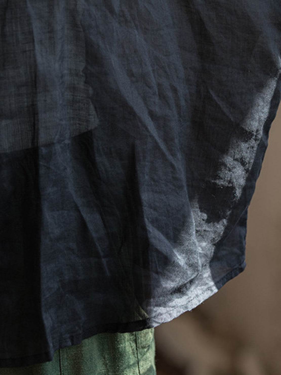 Oversized 100% linen blouse with frog-button closure and curved hem in lightweight fabric