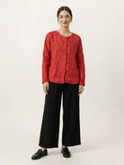 Oversized 100% linen blouse with frog buttons and curved hem in lightweight fabric