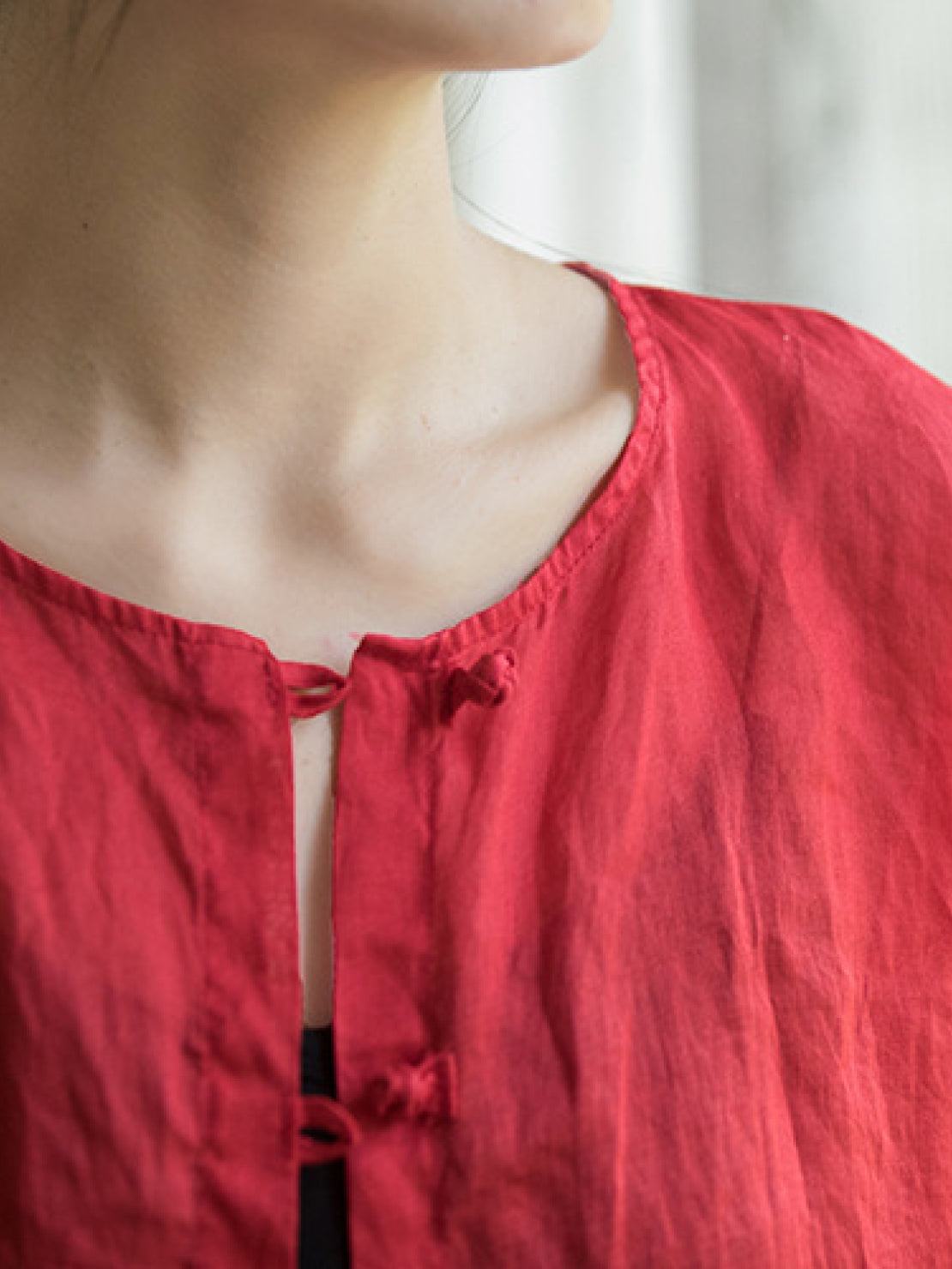 Oversized 100% linen blouse with frog-button closure and collarless neckline