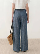 Wide palazzo-leg pure linen yarn-dyed long pants with high-rise elastic waist and natural slub texture