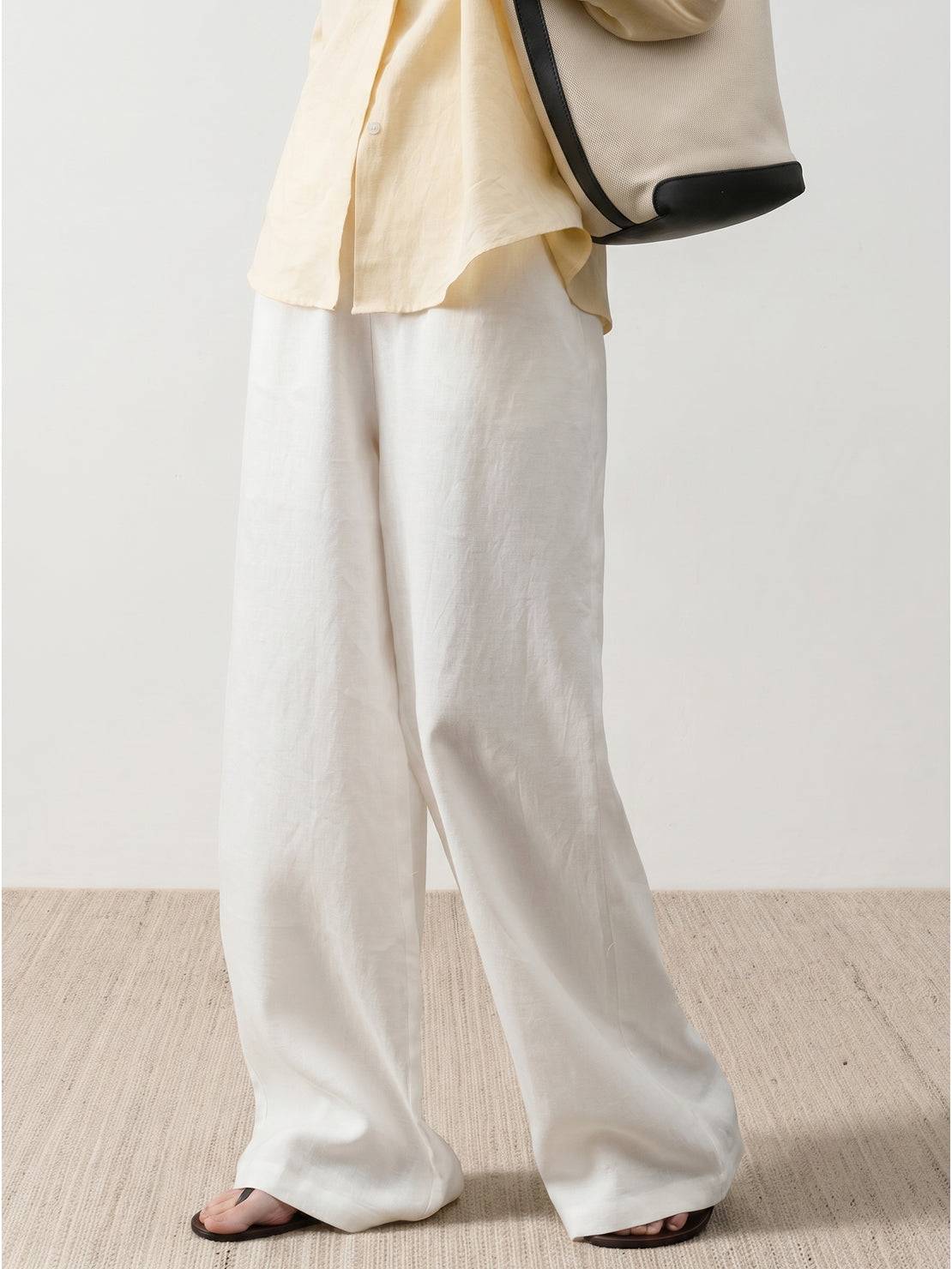 Pure linen yarn-dyed long pants with wide palazzo legs and high-rise waist in natural slub texture