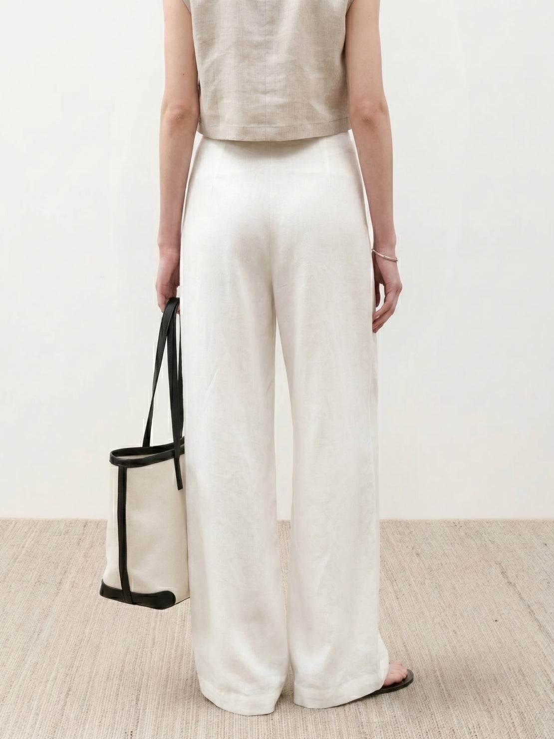 Wide palazzo linen pants in indigo with high-rise elastic waist and natural slub texture