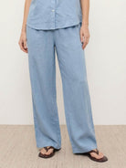 women wearing 100% cotton matching two-piece set with button-front top and wide-leg pants in neutral colors