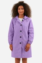 Water resistant oversized windbreaker rain jacket in purple with hood and button closure