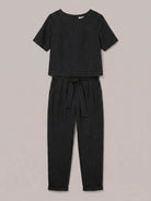 Woman wearing relaxed fit 100% cotton linen monochrome co-ord set with short-sleeve top and straight-leg pants