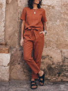 Cotton linen set with relaxed monochrome short-sleeve top and straight-leg pants