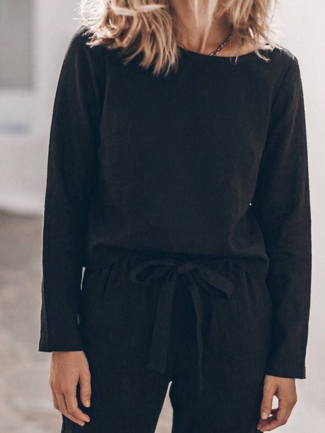Woman wearing relaxed cotton-linen monochrome longline top and wide-leg pants set