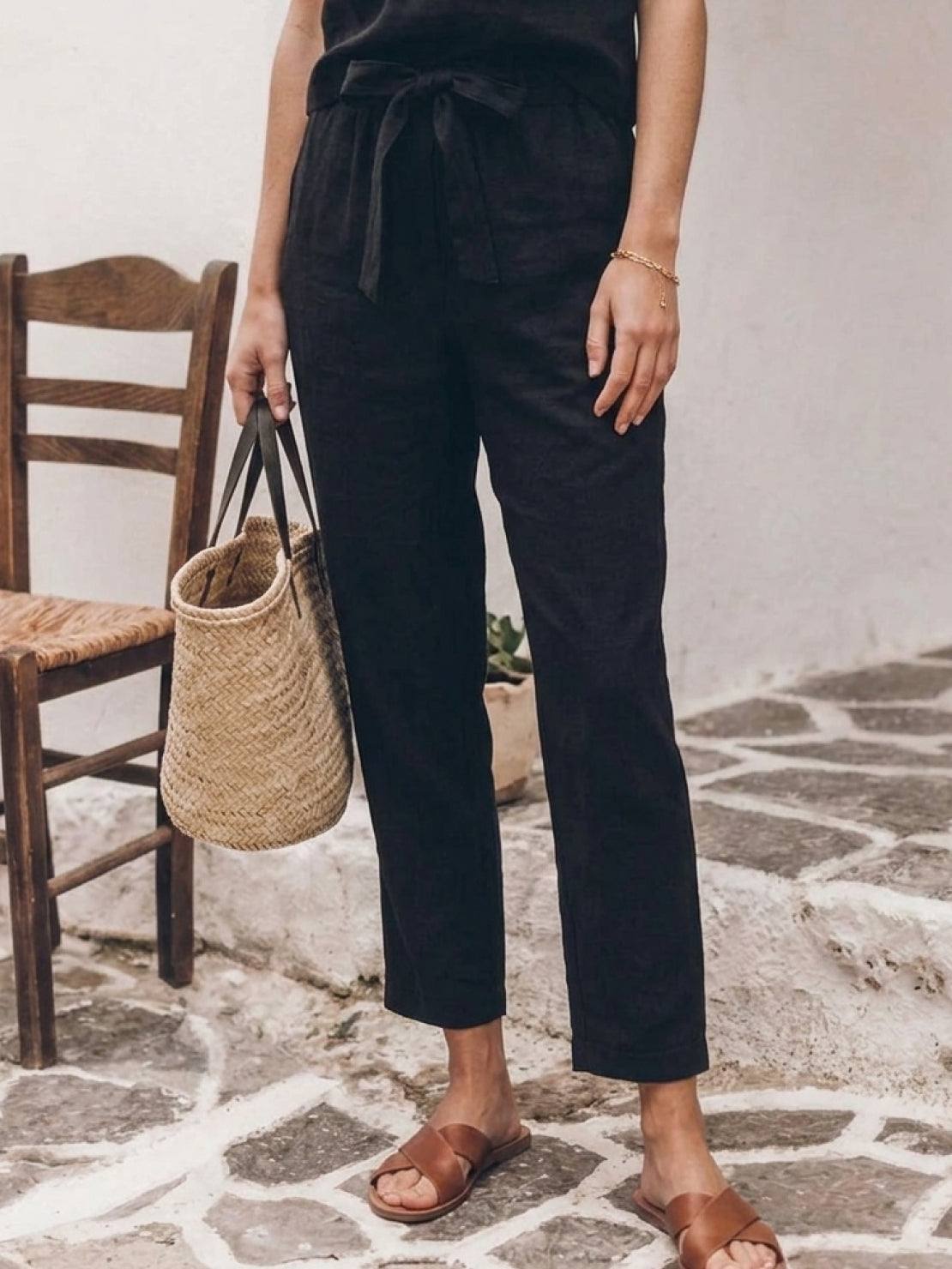 Woman wearing relaxed cotton-linen monochrome longline top and wide-leg pants set