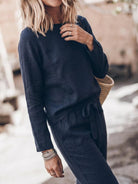 Woman wearing relaxed cotton-linen monochrome longline top and wide-leg pants set