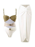 Gold-detail cutout one-piece swimsuit with ruched panels and midi wrap skirt for beachwear