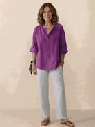 white pure linen age-defying shirt with button detail on mannequin