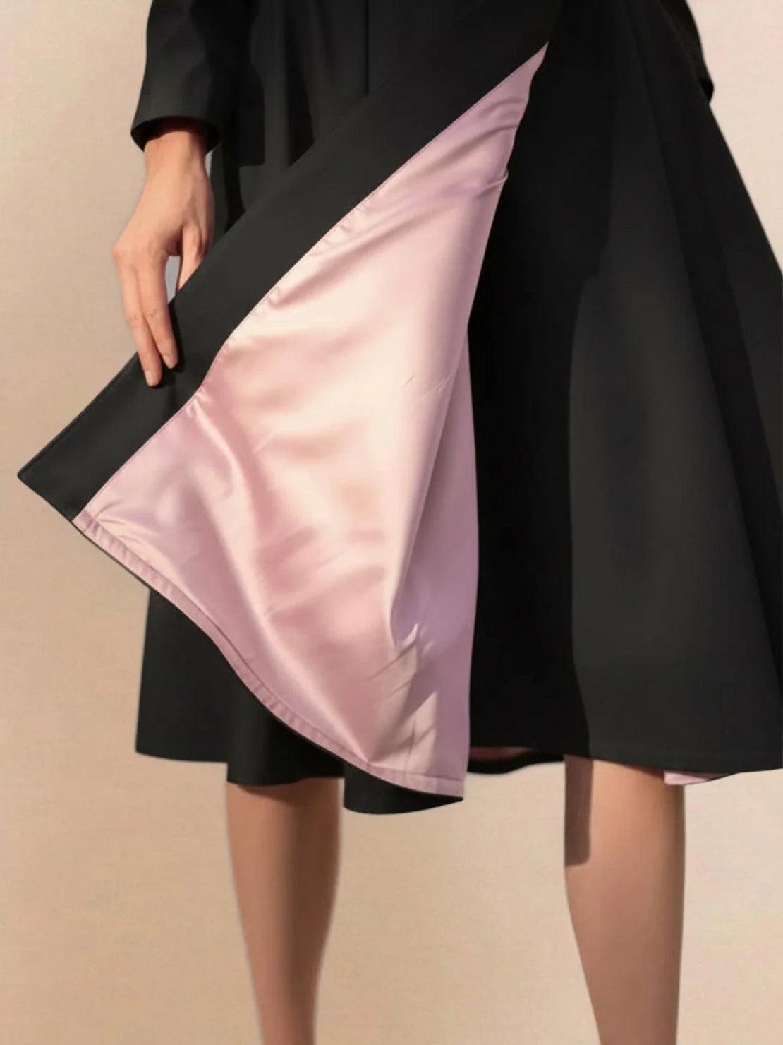 Woman wearing elegant water-repellent A-line hooded raincoat with belt
