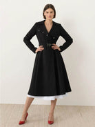 Elegant water-repellent A-line hooded raincoat for women with belt and insulated lining