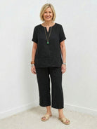 Breezy cotton blend two-piece summer set with short sleeves and elastic waist pants