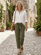 Two women wearing breathable casual chic duo cotton and linen two-piece sets against white background