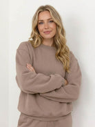 Woman wearing Classic Comfort Athleisure Set in stretchy, wrinkle-resistant fabric