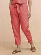 Cotton linen monochrome straight-leg pants in breathable fabric with relaxed fit and drawstring waist