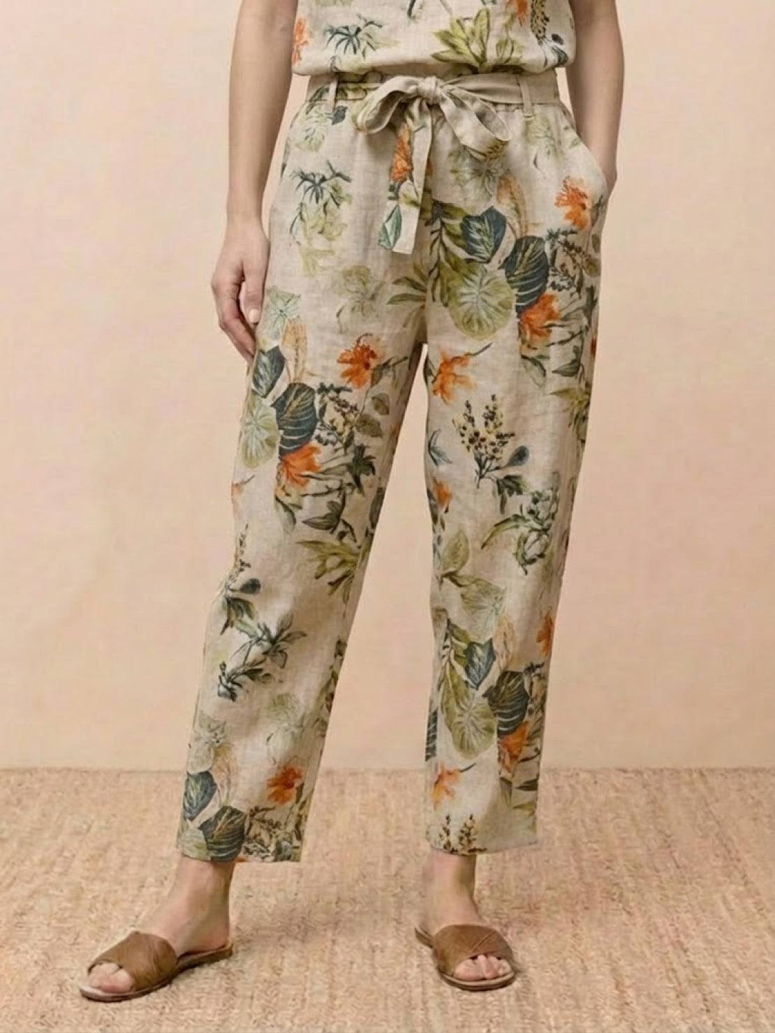 Woman wearing relaxed 100% cotton linen set with short-sleeve top and straight-leg pants in monochrome tones