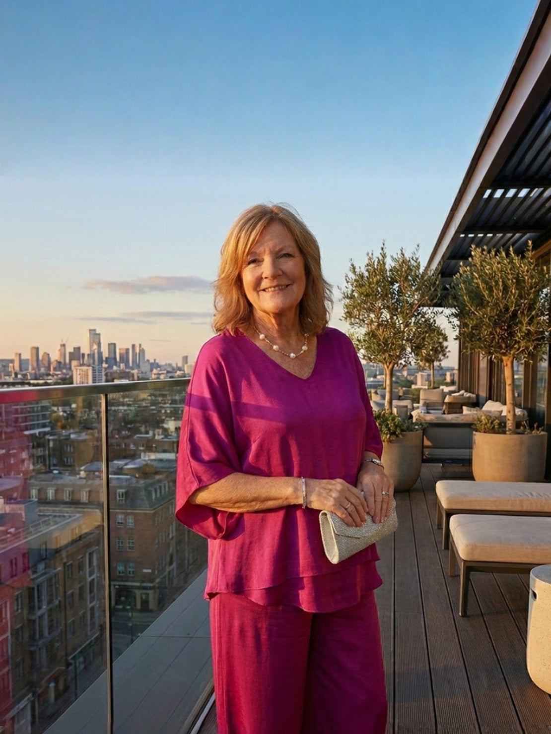 Woman wearing Elegant Layers Two-Piece Set with layered V-neck top and matching pants