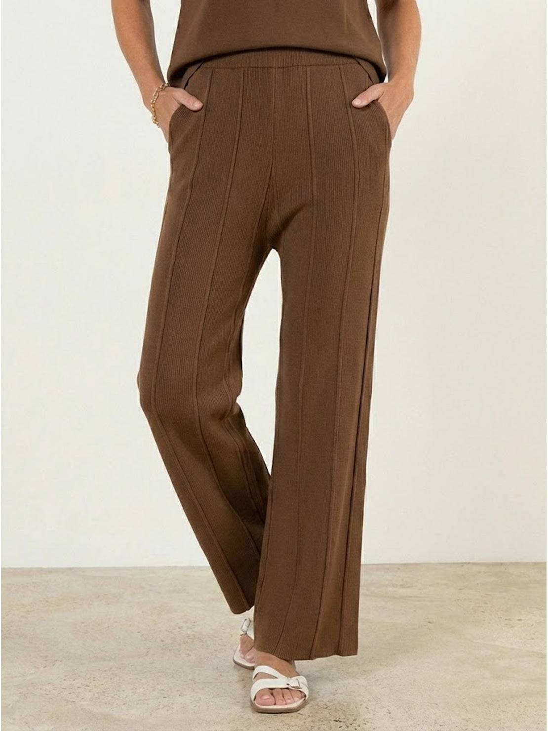 First Class Travel two-piece set in soft wrinkle-resistant viscose-acrylic blend with pleated wide-leg pants and matching top for versatile comfortable elegance