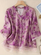 French boutique style elegant organza floral print blouse on wooden hanger