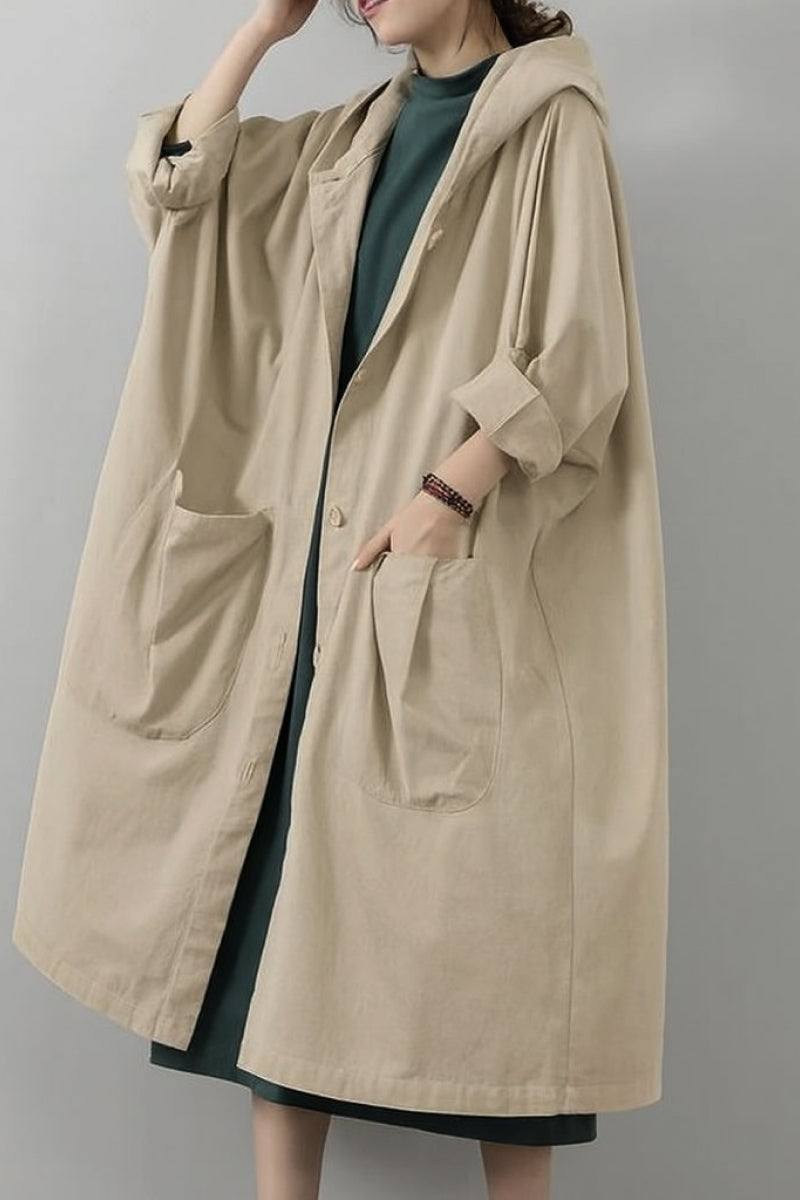 oversized beige Heritage Windbreaker Jacket with hood and large front pockets on model