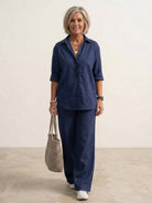 Woman wearing oversized 100% cotton shirt and wide-leg pants co-ord set