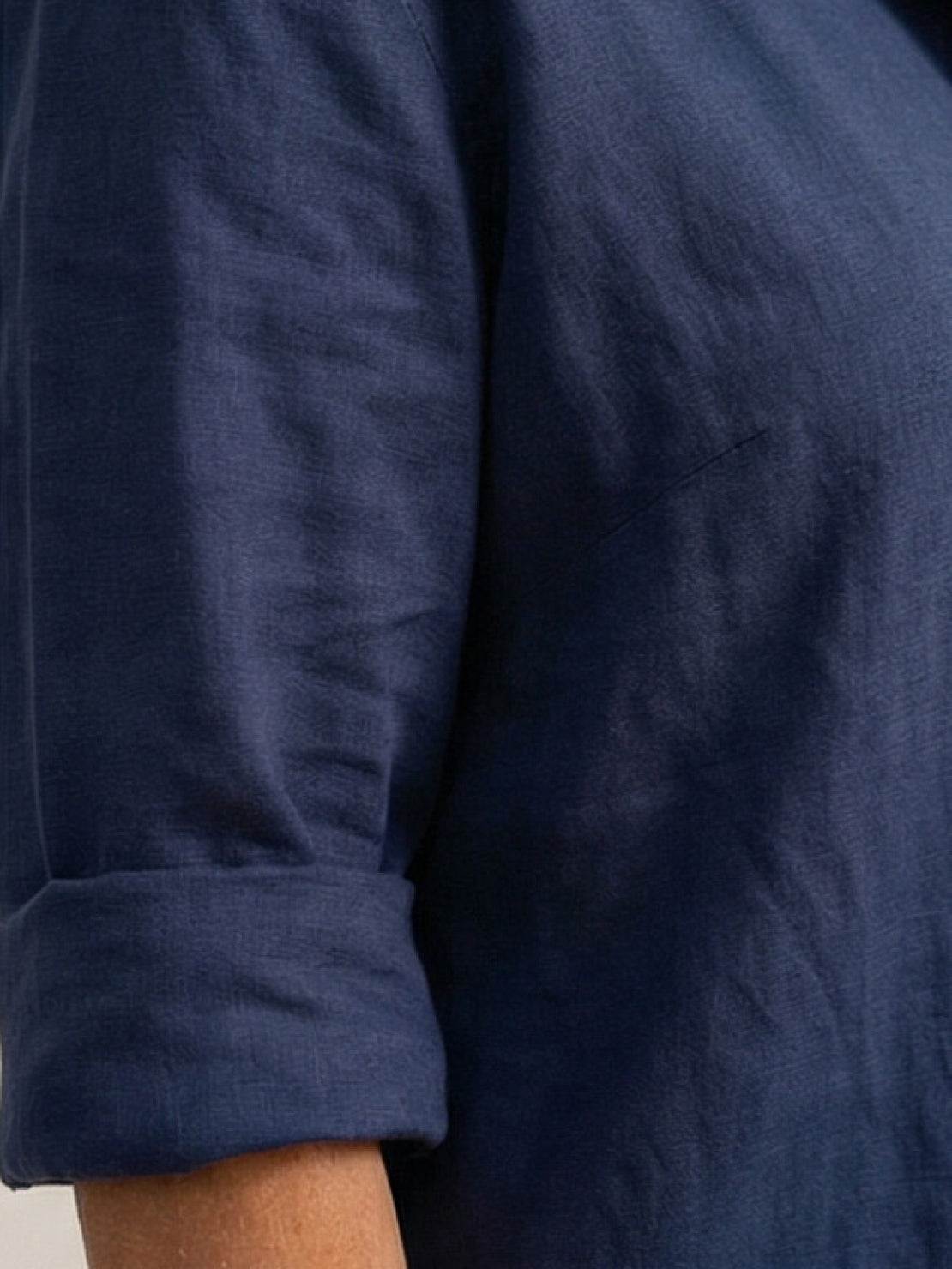 Woman wearing oversized 100% cotton shirt and wide-leg pants co-ord set