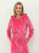 Modern cropped velour tracksuit set with high-waist pants and plush texture