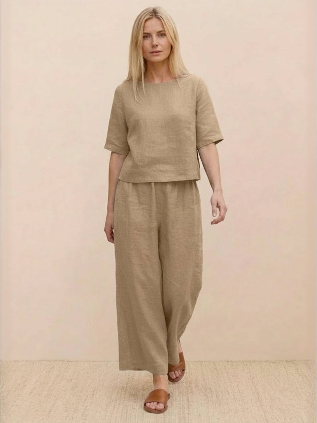 Loose fit co-ord set featuring a soft-tailored top with wide sleeves and wide-leg bottoms in breathable poly-cotton fabric.