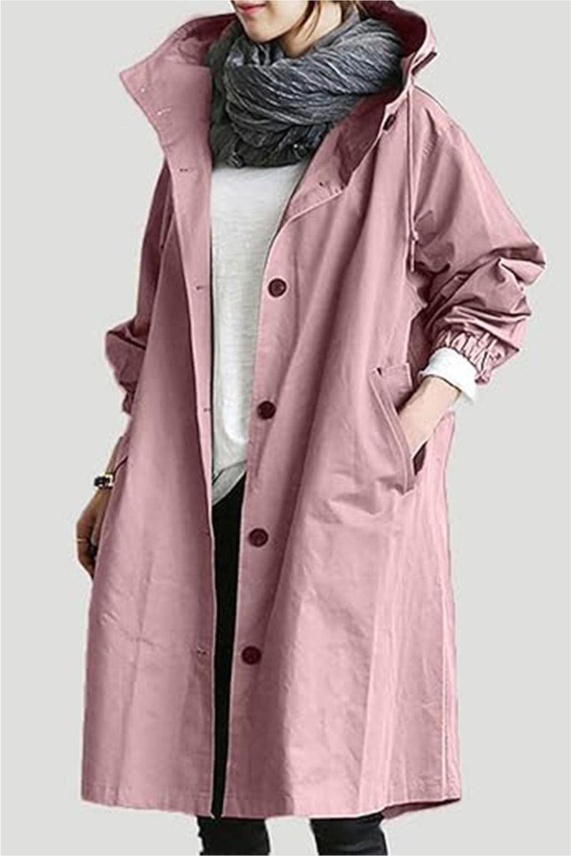 Trendy oversized pink Rain Couture Windbreaker for women, lightweight and water-resistant with hood and pockets.