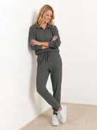 Unisex half-zip pullover and sweatpants set in relaxed fit with soft fabric for casual comfort and travel