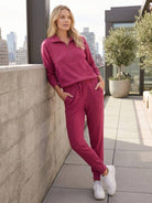 Unisex half-zip pullover and matching sweatpants set for casual comfort and travel