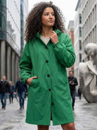 Water-resistant oversized hooded windbreaker rain jacket for outdoor activities