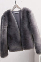 Bold faux fur luxe jacket with V neckline and button closure in soft grey faux mink fur blend