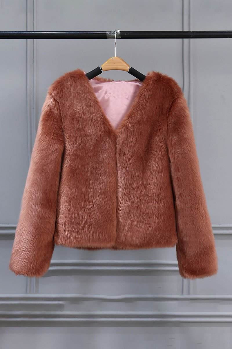 Bold faux fur luxe jacket with V neckline and button front closure in soft, lightweight faux mink blend.